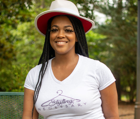 Blinged out women's t-shirt with black stones.